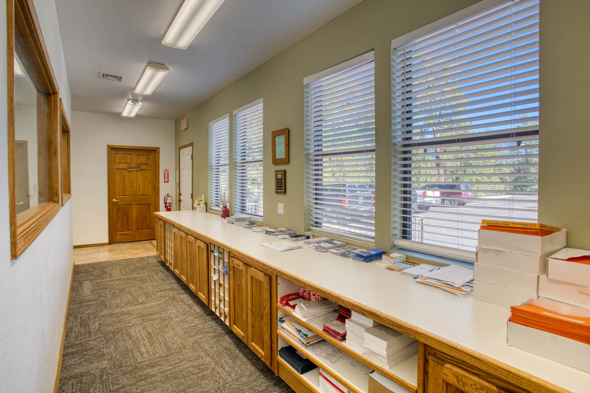 Showlow Office Buildings for Sale (10) Office space with carpet and tile flooring, ample storage, bright feel from large windows. For sale in Show Low, Arizona.