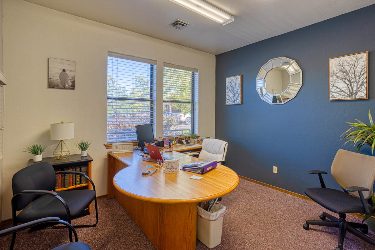 Showlow Office Buildings for Sale (5) Office with carpet flooring, cozy feel, natural light, and wall storage. Quiet location in Show Low, Arizona. For sale.